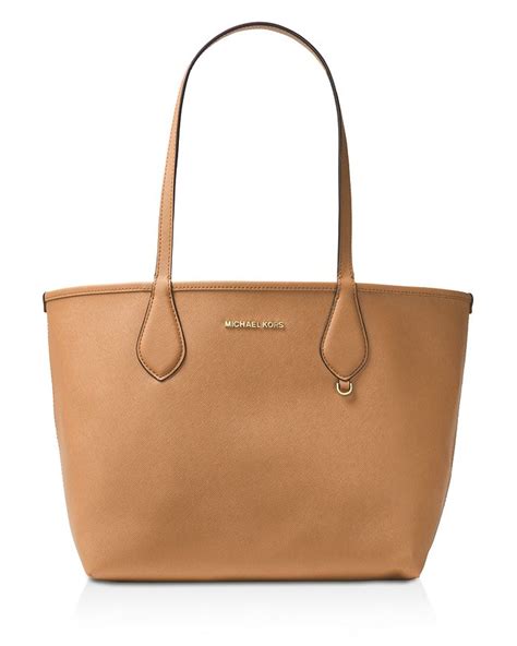 michael michael kors michael michael kors saige medium reversible|Michael Kors leather tote.